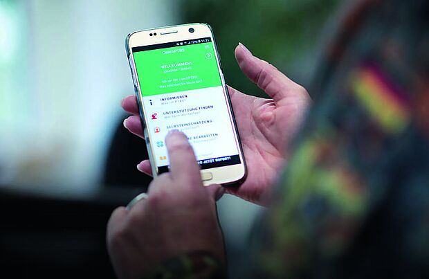 Unterstützung für Betroffene und ihre Familien bieten unter anderem die App „CoachPTBS“. Foto: Bundeswehr
