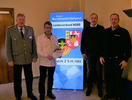 Thomas Behr (von links), Klaus Wunder, Dirk Sommer und der stellvertretende Vorsitzende  ERH im Landesvorstand Nord, Hannes Dreier. Foto: DBwV  